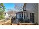Wonderful back deck includes a table and chairs for outdoor entertaining with room to spare at 672 Red Sunset Cir, Powder Springs, GA 30127