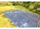 Community basketball court in a wooded area at 672 Red Sunset Cir, Powder Springs, GA 30127