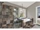 Bathroom featuring a soaking tub, frameless glass shower, and decorative tile surround at 672 Red Sunset Cir, Powder Springs, GA 30127