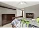 Bedroom with natural light, a ceiling fan, and dressers at 672 Red Sunset Cir, Powder Springs, GA 30127