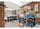 Bright craft room featuring tables, cabinets, and ample storage space at 672 Red Sunset Cir, Powder Springs, GA 30127