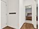 Hallway view into a bedroom with wooden furniture and a ceiling fan at 672 Red Sunset Cir, Powder Springs, GA 30127