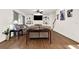 Inviting living room with hardwood floors, a ceiling fan, and comfortable seating at 672 Red Sunset Cir, Powder Springs, GA 30127