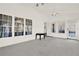 Bright sunroom with access to the backyard through glass doors at 672 Red Sunset Cir, Powder Springs, GA 30127