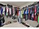 Spacious walk-in closet with ample storage and shelving for optimal organization at 672 Red Sunset Cir, Powder Springs, GA 30127