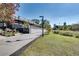 Scenic exterior shot featuring a paved walking path, greenery, and a view of nearby buildings at 680 Greenwood Ne Ave # 202, Atlanta, GA 30306