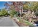 Exterior view of the property showcasing greenery, a paved walkway, and nearby building at 680 Greenwood Ne Ave # 202, Atlanta, GA 30306