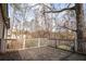 Expansive back deck with wood flooring, offering serene views of the surrounding trees and landscape at 940 Highview Se Dr, Smyrna, GA 30082