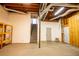 Unfinished basement with stairs to the upper level and unfinished ceiling at 940 Highview Se Dr, Smyrna, GA 30082
