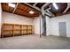 Unfinished basement with open ceiling and a partially finished wall at 940 Highview Se Dr, Smyrna, GA 30082