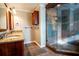 Granite vanity, tile flooring, glass-enclosed tile shower at 940 Highview Se Dr, Smyrna, GA 30082