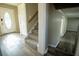 Hallway with carpeted stairs and wood-look flooring throughout at 940 Highview Se Dr, Smyrna, GA 30082
