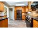 Well-equipped kitchen with granite countertops, stainless steel appliances, and ample cabinet space at 940 Highview Se Dr, Smyrna, GA 30082