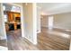 Bright, open-concept living room with wood-look flooring, neutral walls, and natural light at 940 Highview Se Dr, Smyrna, GA 30082