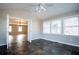 Sun room with vaulted ceiling, fan, large windows, and slate floors, connecting to living room at 940 Highview Se Dr, Smyrna, GA 30082