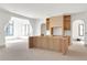 Spacious, unfinished kitchen featuring a large island and custom cabinetry at 2369 Drew Valley Ne Rd, Atlanta, GA 30319
