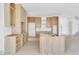 Bright, open-concept kitchen featuring custom wood cabinetry, a spacious layout and a center island at 2369 Drew Valley Ne Rd, Atlanta, GA 30319