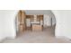 Open-concept living room, features arched entryway into the kitchen area, enhancing the home's flow at 2369 Drew Valley Ne Rd, Atlanta, GA 30319