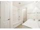 Full bathroom features tub with shower and single vanity at 2414 Clock Face Ct, Lawrenceville, GA 30043