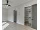 Bright bedroom with recessed lighting, a ceiling fan, and a view into the closet at 4238 Hamilton Mill Rd, Buford, GA 30519