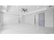 Expansive bedroom with modern recessed lighting, ceiling fan, and a neutral color palette on the walls at 4238 Hamilton Mill Rd, Buford, GA 30519