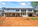 Modern home under construction showing its architectural structure and framing at 4238 Hamilton Mill Rd, Buford, GA 30519