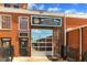 A close up view of Tannery Row Ale House entry and overhead door at 4238 Hamilton Mill Rd, Buford, GA 30519
