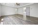 Open concept living room with hardwood floors and recessed lighting at 4238 Hamilton Mill Rd, Buford, GA 30519