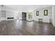Spacious living area featuring an electric fireplace and a built-in desk for working at home at 4238 Hamilton Mill Rd, Buford, GA 30519