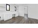 Bright home office space with built-in desk and shelving; an ideal workspace at 4238 Hamilton Mill Rd, Buford, GA 30519