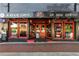Restaurant exterior with bold black and red accents, large windows, and a welcoming entrance at 4238 Hamilton Mill Rd, Buford, GA 30519