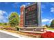Entrance for Buford Community Center with an electronic display, lush landscaping, and signage at 4238 Hamilton Mill Rd, Buford, GA 30519