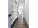 Custom walk-in closet featuring ample shelving and storage space, with access to bedroom at 4238 Hamilton Mill Rd, Buford, GA 30519