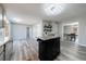 Open kitchen floor plan featuring island, dining area, gray floors, and recessed lighting at 2151 Jonquil Ct, Canton, GA 30115