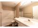 Bathroom featuring a vanity sink and a shower and tub combo with neutral wall color at 2535 Fairmont Park Ct, Dacula, GA 30019