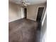 A neutral bedroom with a ceiling fan and a large walk-in closet offers a serene retreat at 2535 Fairmont Park Ct, Dacula, GA 30019