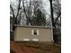 View of a modest storage shed providing ample space for all of your storage needs at 2535 Fairmont Park Ct, Dacula, GA 30019