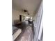 Enclosed sunroom with tile flooring and multiple ceiling fans; great for relaxation at 2535 Fairmont Park Ct, Dacula, GA 30019
