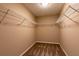 Spacious walk-in closet with wire shelving ready for customized storage solutions at 2535 Fairmont Park Ct, Dacula, GA 30019