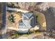 Aerial view of a stately home with meticulous landscaping and a private driveway at 1355 Cashiers Way, Roswell, GA 30075