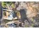 Overhead view of an estate highlighting its landscaping, driveway, and backyard patio at 1355 Cashiers Way, Roswell, GA 30075