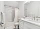 This bathroom features a tub with shower and bright white vanity with chrome fixtures at 1355 Cashiers Way, Roswell, GA 30075