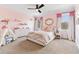 Charming pink bedroom featuring large windows, ceiling fan and ample space for playing at 1355 Cashiers Way, Roswell, GA 30075