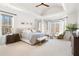 Spacious main bedroom boasts abundant natural light, sitting area, and tray ceiling at 1355 Cashiers Way, Roswell, GA 30075