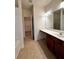 Bathroom featuring a large vanity, a walk-in shower, and tile flooring at 3476 Harvest Ridge Ln, Buford, GA 30519