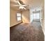 This bedroom features two windows with blinds, neutral walls, and a ceiling fan with overhead lighting at 3476 Harvest Ridge Ln, Buford, GA 30519