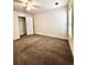 Bedroom features a ceiling fan, window, and walk-in closet at 3476 Harvest Ridge Ln, Buford, GA 30519