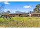 Large backyard featuring a patio, ample green space, and room for recreation at 1646 Flicker Rd, Jonesboro, GA 30238