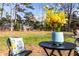 Cozy backyard patio with outdoor seating, creating a relaxing and inviting space at 1646 Flicker Rd, Jonesboro, GA 30238