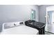 Laundry room features gray walls, new appliances and a door to another room at 1646 Flicker Rd, Jonesboro, GA 30238